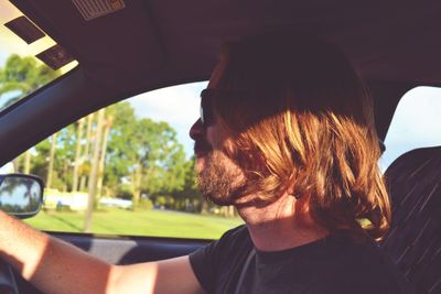 Portrait of woman in car