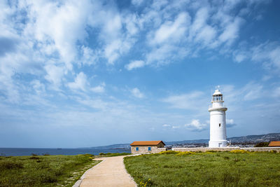 The lighthouse of paphos against a big cloudy sky 