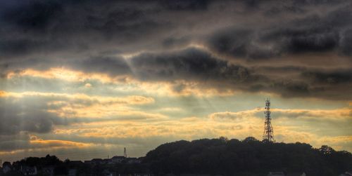 Scenic view of landscape against cloudy sky