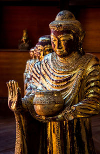 Close-up of statue against temple