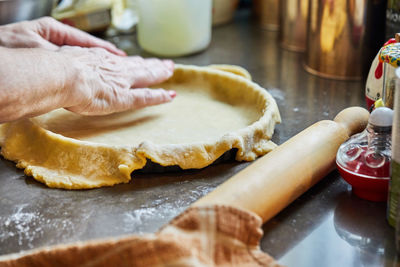 Midsection of person preparing food