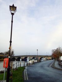 Street light against sky