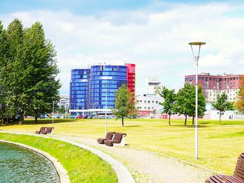 View of buildings against cloudy sky