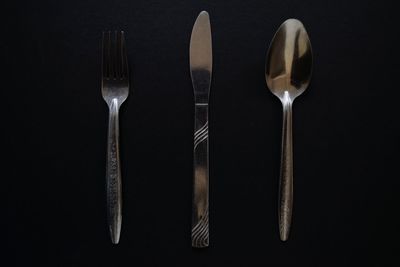 Directly above shot of eating utensils arranged on table