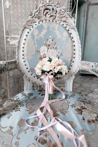 Close-up of white flower bouquet on table