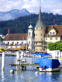 Lake lucerne boat and architecture with mountain background