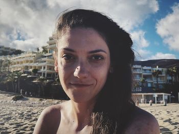 Portrait of young woman at beach