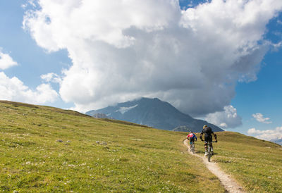 Mountain bikers in the high mountains in the alps in tignes in summer