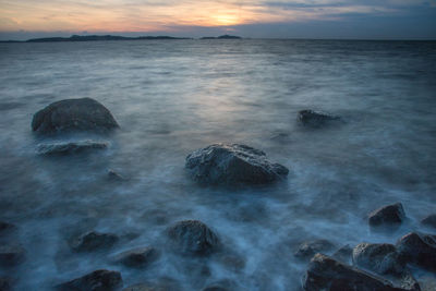 Scenic view of sea against sky during sunset