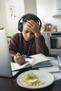 Boy doing homework at home