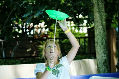 Close-up of girl learning a circus act