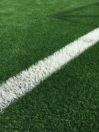 High angle view of white single line on soccer field