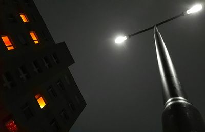 Low angle view of building against sky at night