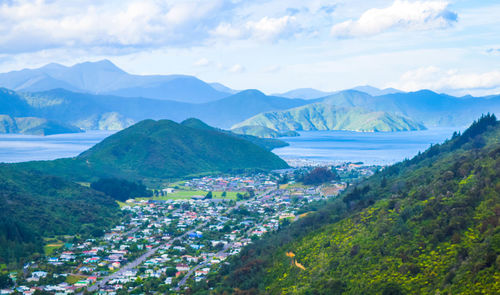 High angle view of townscape and mountains