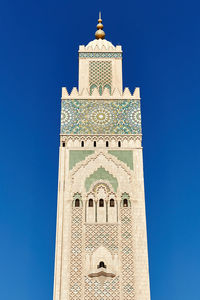 Low angle view of building against blue sky