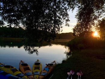 Scenic view of lake at sunset