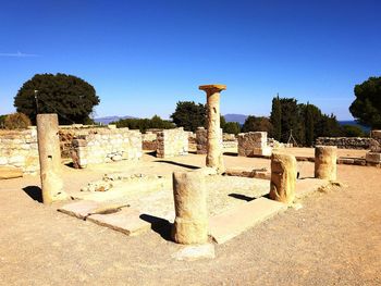 Stone wall against clear sky