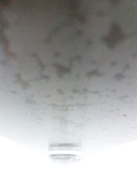 Low angle view of illuminated ceiling