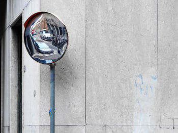 Close-up of clock on wall