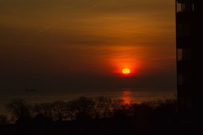 Scenic view of silhouette landscape against sky during sunset