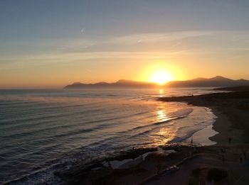 Scenic view of sea against sky during sunset