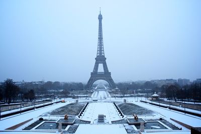 Eiffel tower against sky during winter