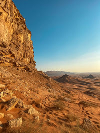 Scenic view of rock against clear sky