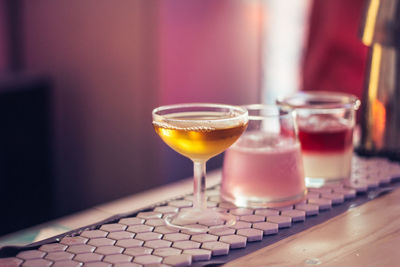 Close-up of cocktail in glass on table