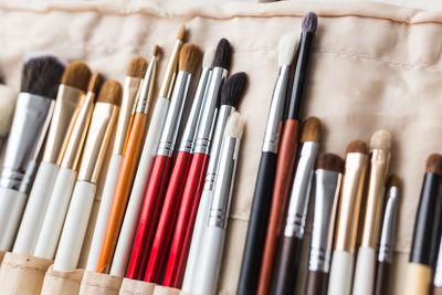 High angle view of multi colored pencils in shelf