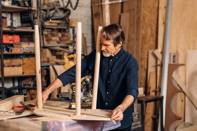 Man working on wood