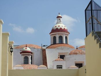 Low angle view of church against blue sky