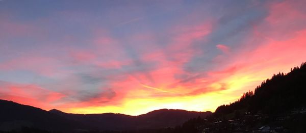 Scenic view of dramatic sky during sunset