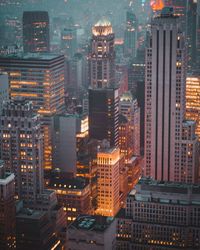 High angle view of illuminated buildings in city