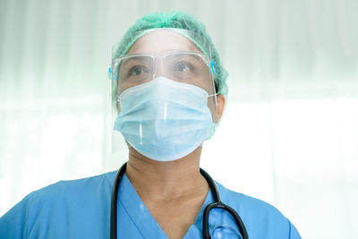 Portrait of female doctor wearing mask