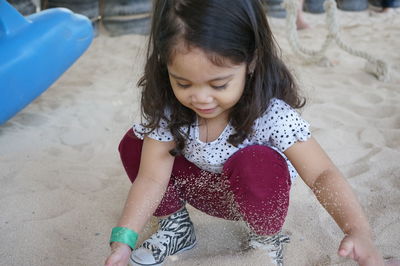 High angle view of cute girl playing