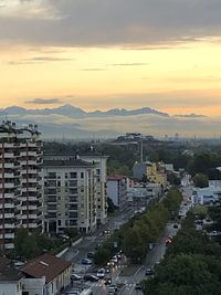 High angle view of buildings against sky during sunset