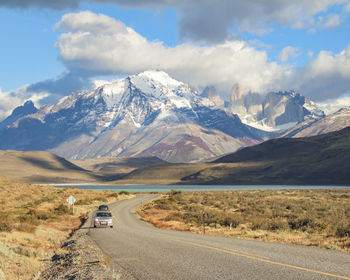 Scenic view of snowcapped mountains against sky