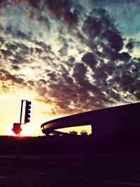 Low angle view of cloudy sky at sunset