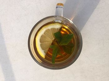High angle view of tea in glass on table