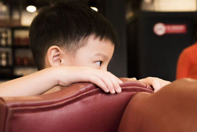 Close-up of boy at home