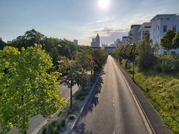Panoramic view of sunset over empty street in frankfurt with skyscrapers in the background