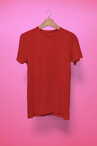 Built structure hanging against pink background