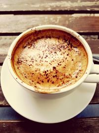 Close-up of cappuccino on table