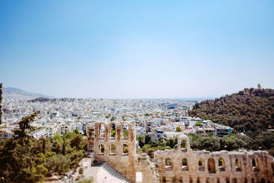 Aerial view of town against clear sky