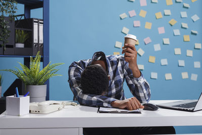 High angle view of people working at home
