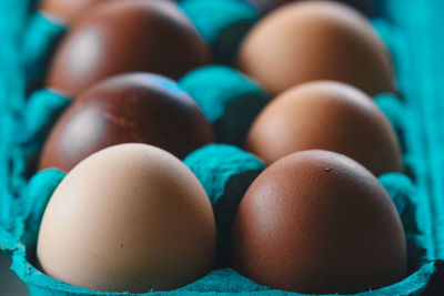 Close-up of eggs in carton