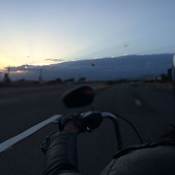 Cropped image of man against sky at sunset