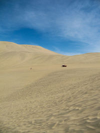 Remote desert travel through sand dunes. concept wanderlust, adventure travel, wilderness.