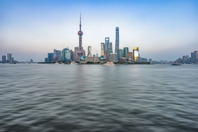 View of buildings in city at waterfront