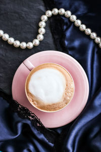 High angle view of coffee on table